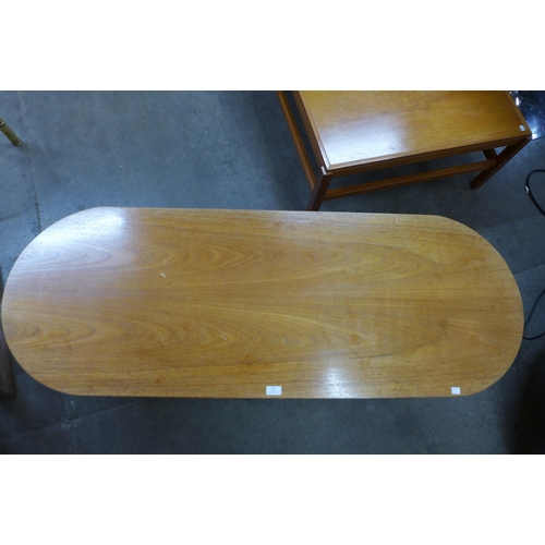 92 - A teak oval coffee table