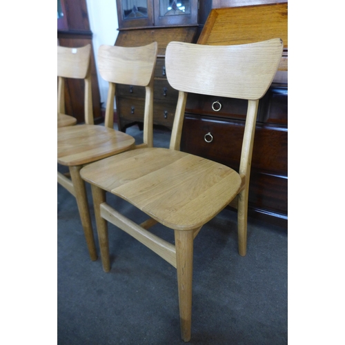 96 - A set of four oak and ash chairs