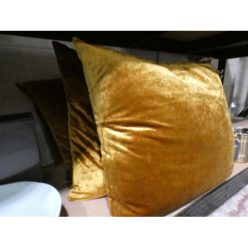 3119 - Set of four Paoletti mustard velvet cushions * This lot is subject to VAT