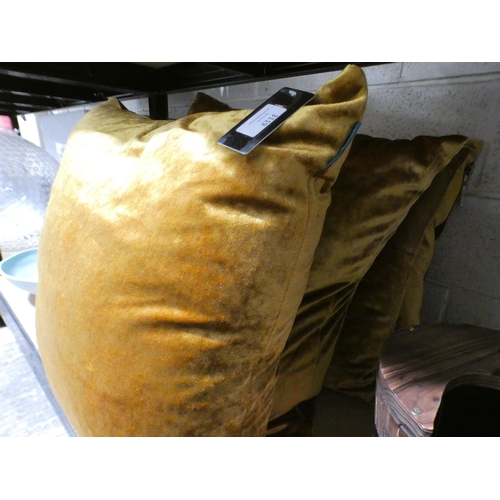 3119 - Set of four Paoletti mustard velvet cushions * This lot is subject to VAT