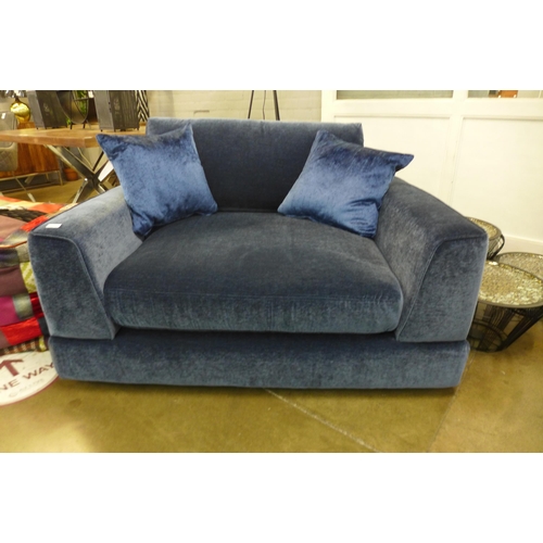 1302 - A blue upholstered Maximus snuggle chair