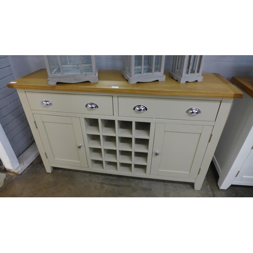 1340 - A Chester grey painted oak two door large sideboard with wine rack (NC-LS-PT) * this lot is subject ... 