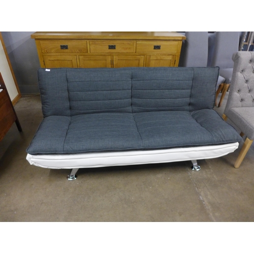 1474 - A cream and charcoal fabric fold down sofa bed