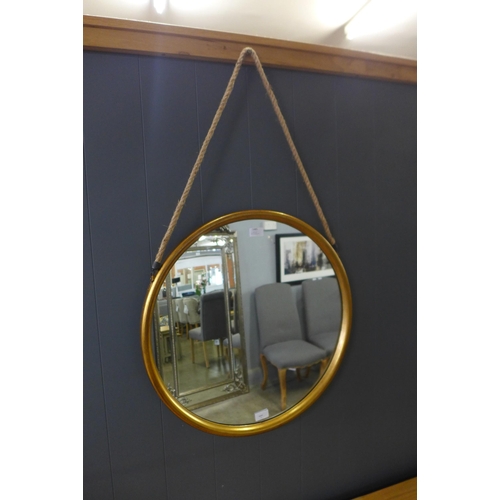 1485 - A large round gold mirror on a hanging rope, 58cm (JRG1114) #