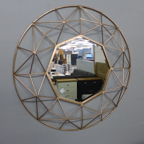 1524 - A copper framed octagonal mirror * this lot is subject to VAT 90cm diameter