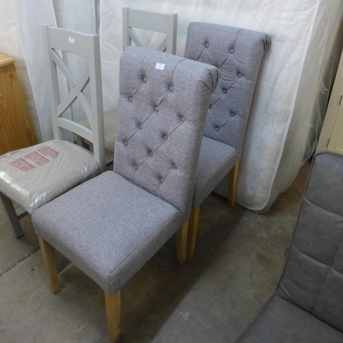 1541 - A pair of grey upholstered button back dining chairs * this lot is subject to VAT