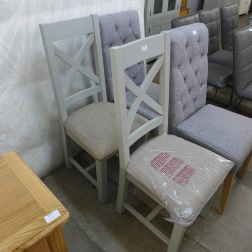 1542 - A pair of grey upholstered dining chairs * this lot is subject to VAT