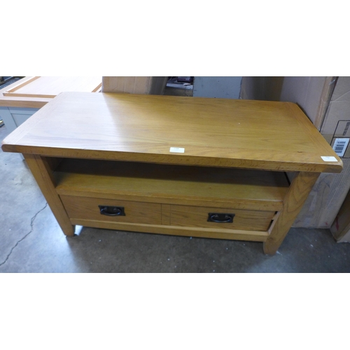 1588 - A Rustic oak small TV unit, Damaged joints (NC-TV-OAK)  *This lot is subject to VAT