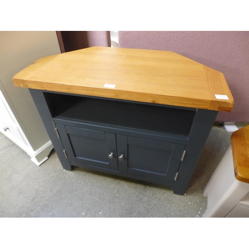 1649 - A Hampshire blue painted corner TV unit, split to frame *This lot is subject to VAT