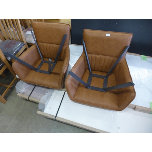 1723 - A pair of brown leather effect armchairs, missing bolts * this lot is subject to VAT