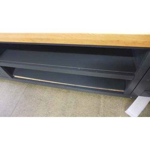 1750 - A Hampshire blue painted oak extra large TV unit Damage to base, missing fittings (KEL P32-73)  *Thi... 