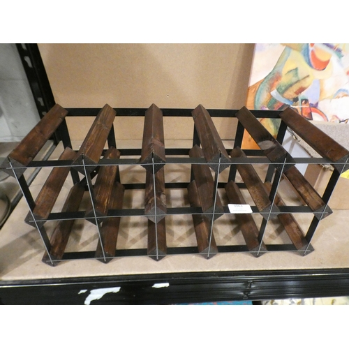 3063 - Darkwood and metal wine rack * This lot is subject to VAT