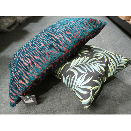 3069 - Blue and pink textured cushion and a palm leaf patterned outdoor cushion * This lot is subject to VA... 