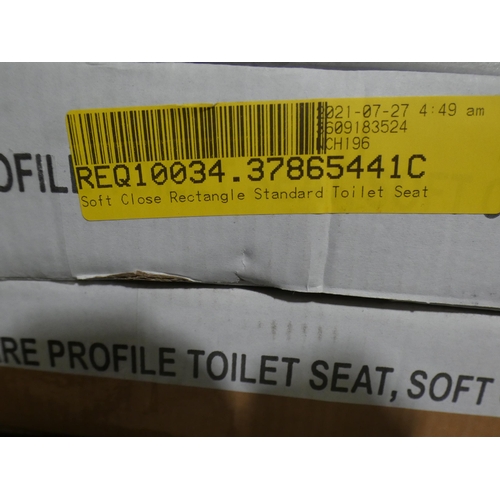 3080 - Two plastic square soft-close toilet seats and one wooden * This lot is subject to VAT