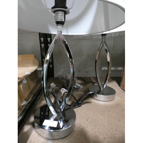 3084 - Pair of chrome effect lamps with white shades * This lot is subject to VAT