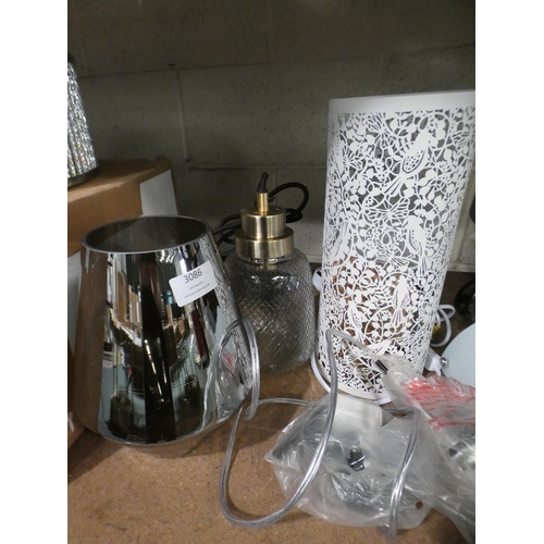 3086 - Decorative white metal table lamp and two glass pendant lights * This lot is subject to VAT