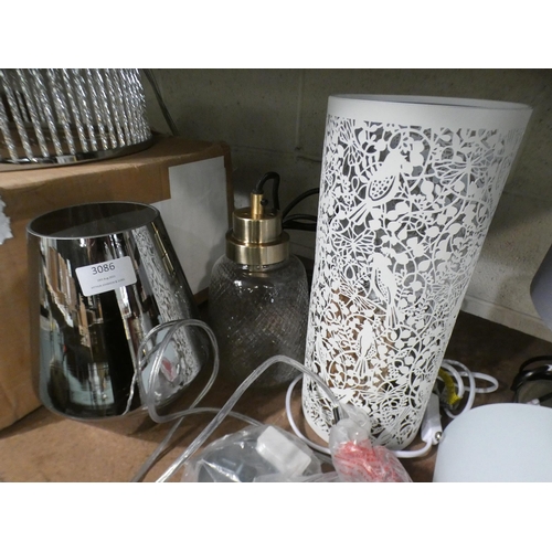 3086 - Decorative white metal table lamp and two glass pendant lights * This lot is subject to VAT