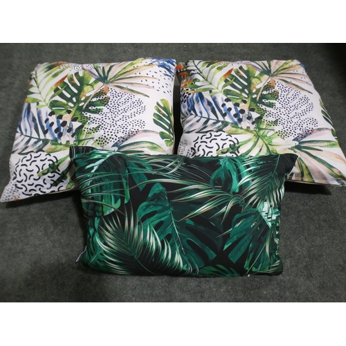 3094 - Three botanical themed outdoor cushions * This lot is subject to VAT