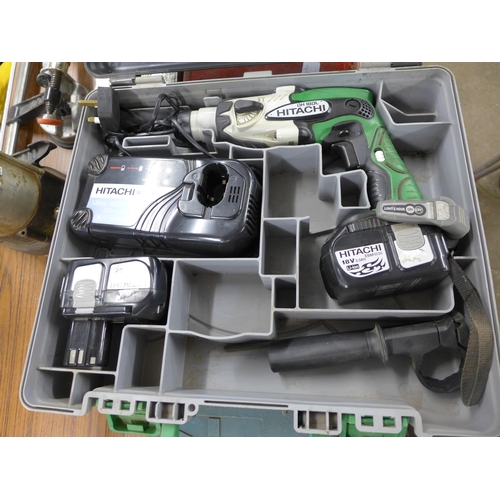 2324 - 2 Makita 110v drills in cases with Hitachi cordless 18v hammer drill - a/f * This lot is subject to ... 