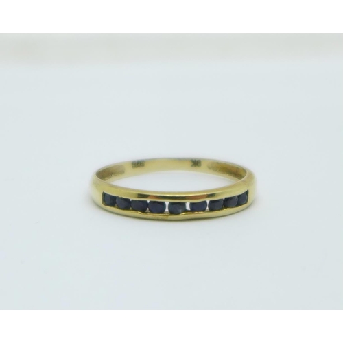 1296 - A 9ct gold and sapphire ring, 1g, O