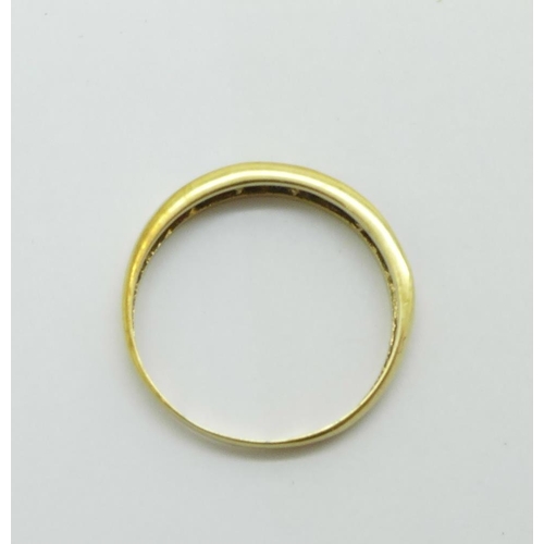 1296 - A 9ct gold and sapphire ring, 1g, O