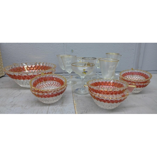 1128 - A collection of glassware including Babycham glasses, two colour glass bowl and smaller bowls, etc. ... 