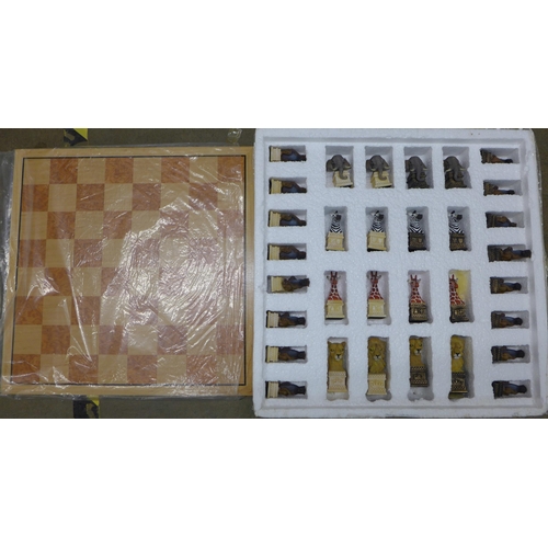 1131 - A resin animal chess set **PLEASE NOTE THIS LOT IS NOT ELIGIBLE FOR POSTING AND PACKING**