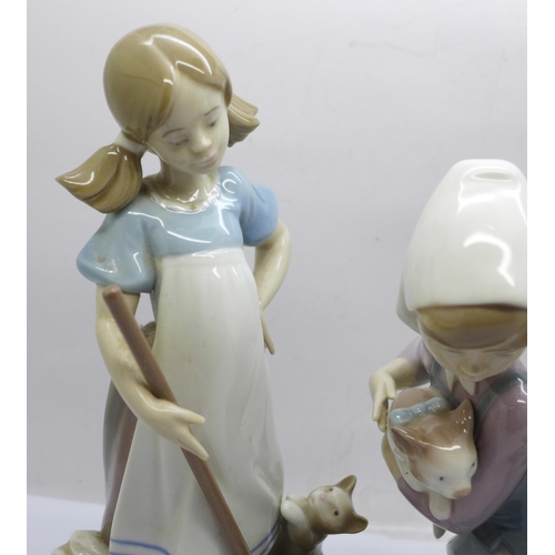 602 - Three Lladro figures, tallest 22cm