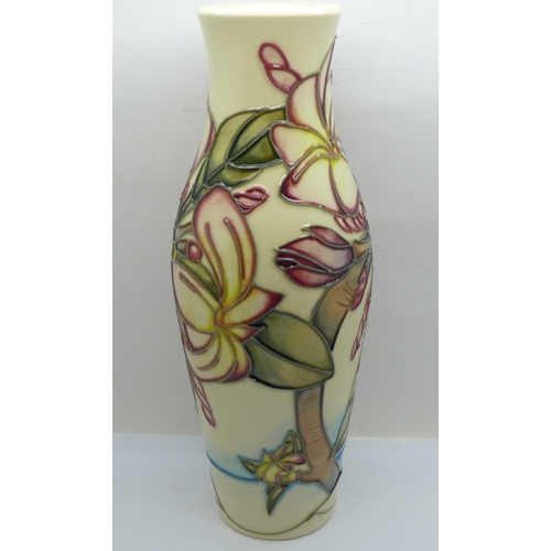 604 - A Moorcroft vase designed by Emma Bossons, 26cm