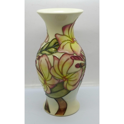 605 - A Moorcroft vase designed by Emma Bossons, 19.5cm