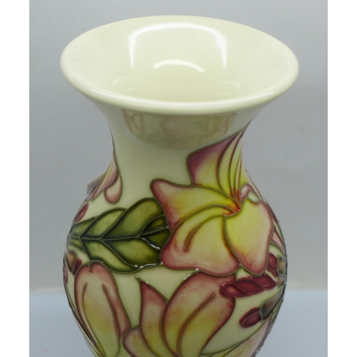 605 - A Moorcroft vase designed by Emma Bossons, 19.5cm