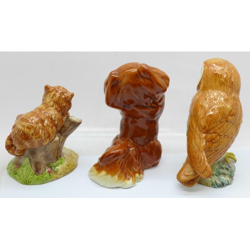 610 - Three Beswick figures; Barn Owl, Pekinese dog and Cheshire Cat