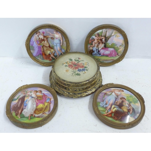 613 - A set of four framed porcelain plaques and a trinket box