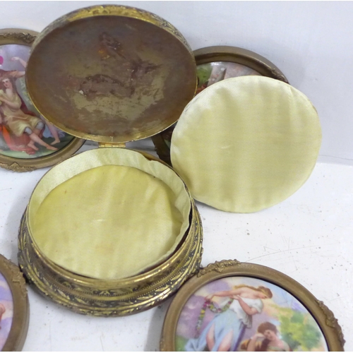 613 - A set of four framed porcelain plaques and a trinket box