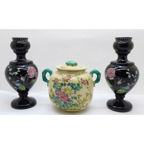 614 - A pair of enamel decorated vases and a pot with lid, (pot a/f)