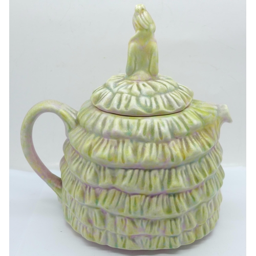 615 - A Ye Daintee Ladyee Crinoline teapot, circa 1930