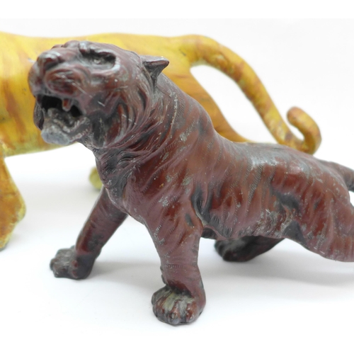 617 - Two cold painted figures of tigers, largest 23.5cm