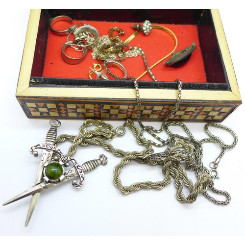 653 - Costume jewellery in a Russian wooden box