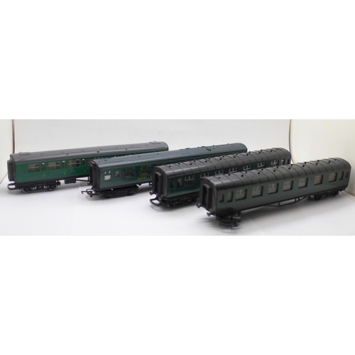 655 - Four Hornby and Tri-ang green OO gauge railway carriages