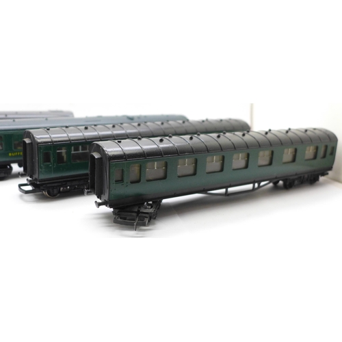 655 - Four Hornby and Tri-ang green OO gauge railway carriages