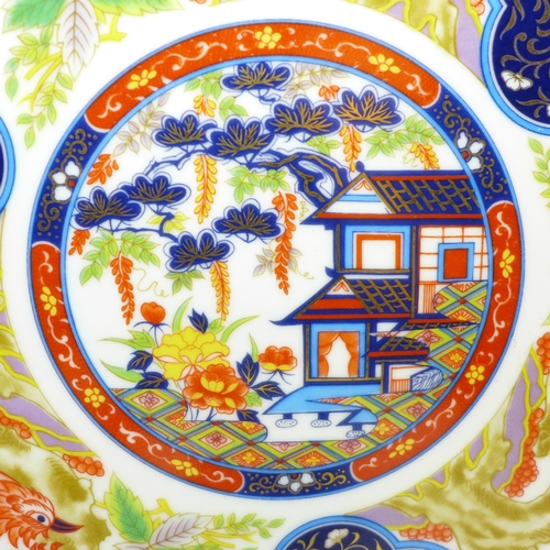 656 - Three Imari Japan plates, 26.5cm