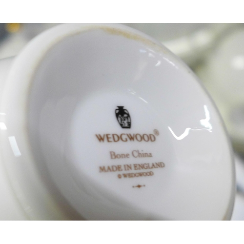 657 - A collection of Wedgwood Chartley dinnerware, teaware and coffee ware, six setting comprising dinner... 