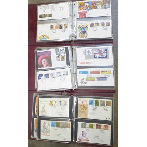 660 - Three albums of first day covers comprising 1971-1979, 1986-1992 and 1998-2004