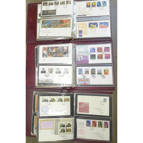 660 - Three albums of first day covers comprising 1971-1979, 1986-1992 and 1998-2004