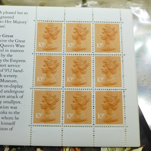 667 - A folder of stamps and stamp booklets