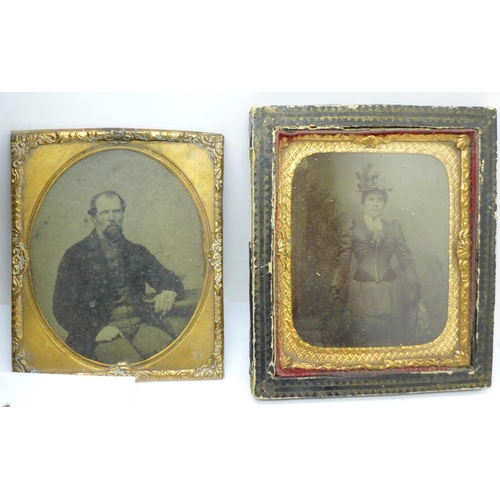 670 - Four Ambrotype photographs and an empty carte de visite album