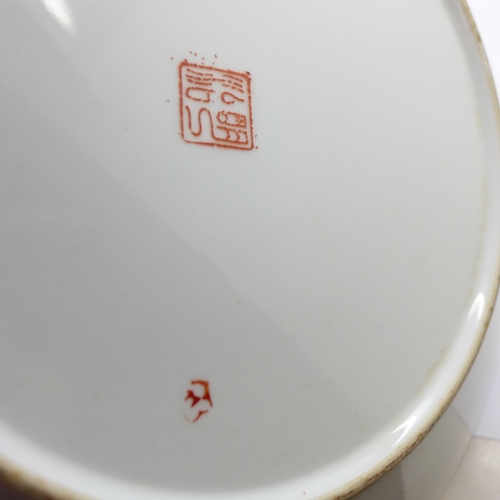 673 - Two Japanese plates including Imari, 26cm