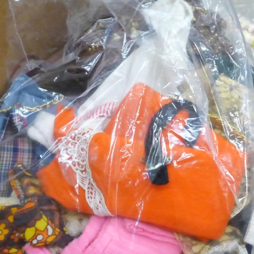 730 - A large collection of Sindy clothing, footwear, accessories, etc., and nine dolls