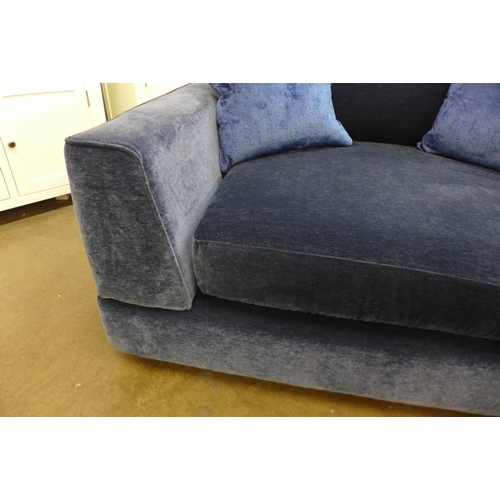 1325 - A blue upholstered Maximus snuggle chair