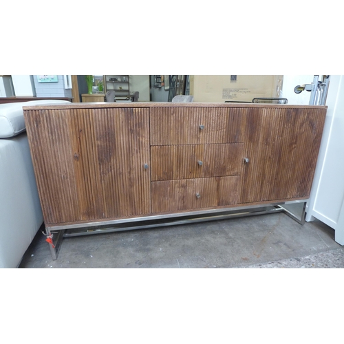 1327 - A Lynx three door sideboard